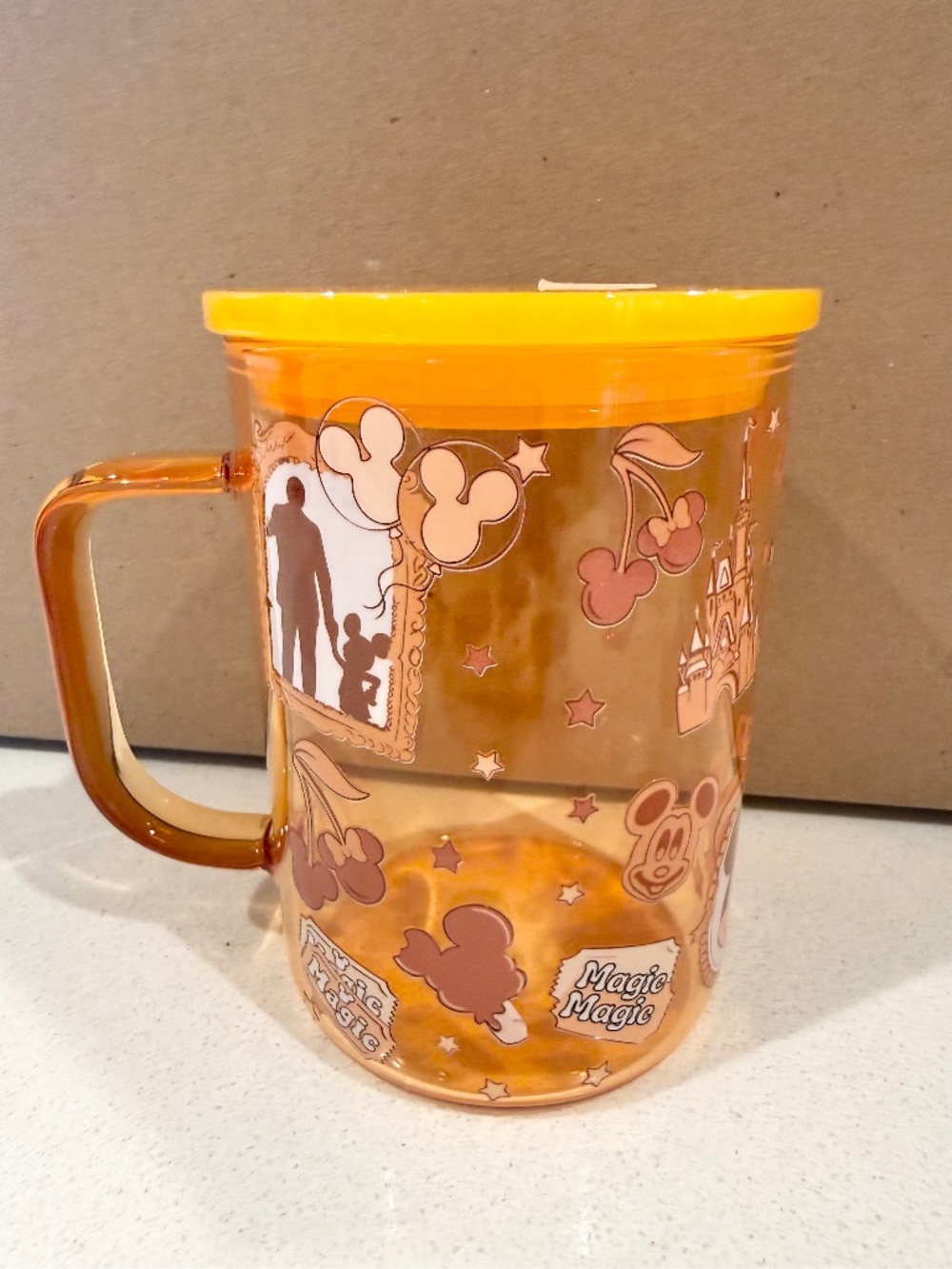 Golden yellow Disney glass mug
